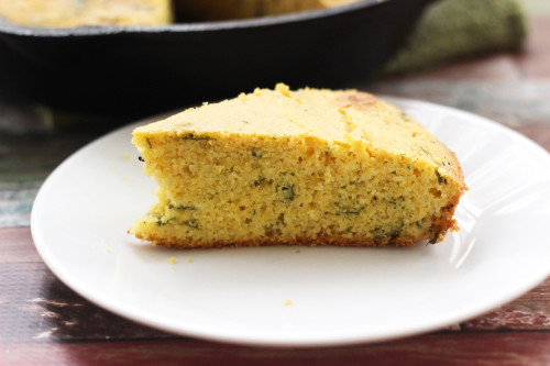 Learn how to make southern style skillet cornbread with this easy cornbread recipe. The addition of cilantro gives this cornbread a southwest twist!