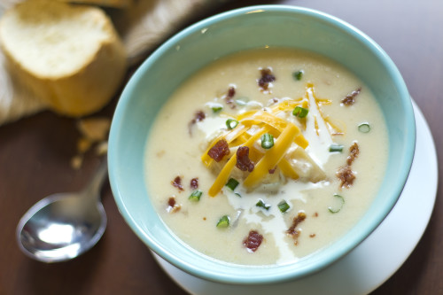 This is not your average loaded baked potato soup recipe. Fried potatoes make it even more sinful. Possibly the best potato soup you'll ever make!