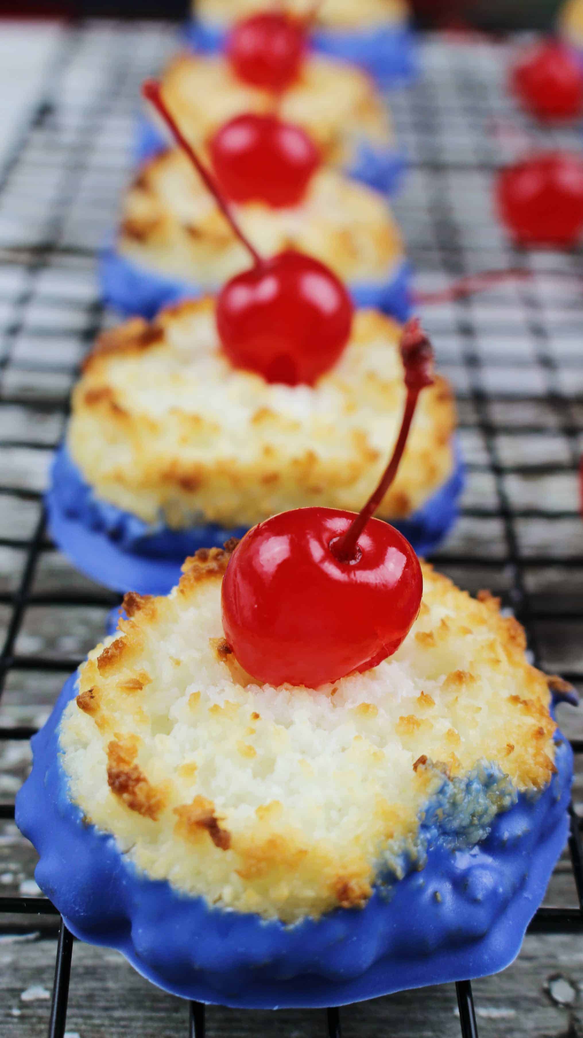 If you're looking for Memorial Day food or 4th of July food, check out these fun patriotic desserts! Coconut Macaroon Cherry Bombs incorporate red, white, and blue in the tastiest of ways.