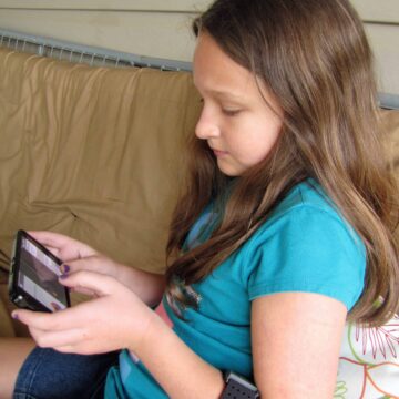 child playing a biofeedback game for emotional self-regulation