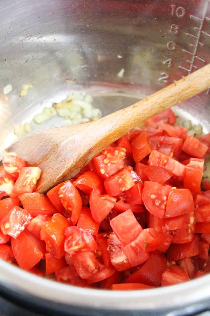 vegan tomato soup sauteing in the instant pot