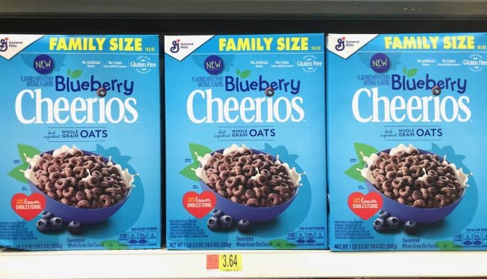 three family size boxes of blueberry cheerios on a walmart store shelf