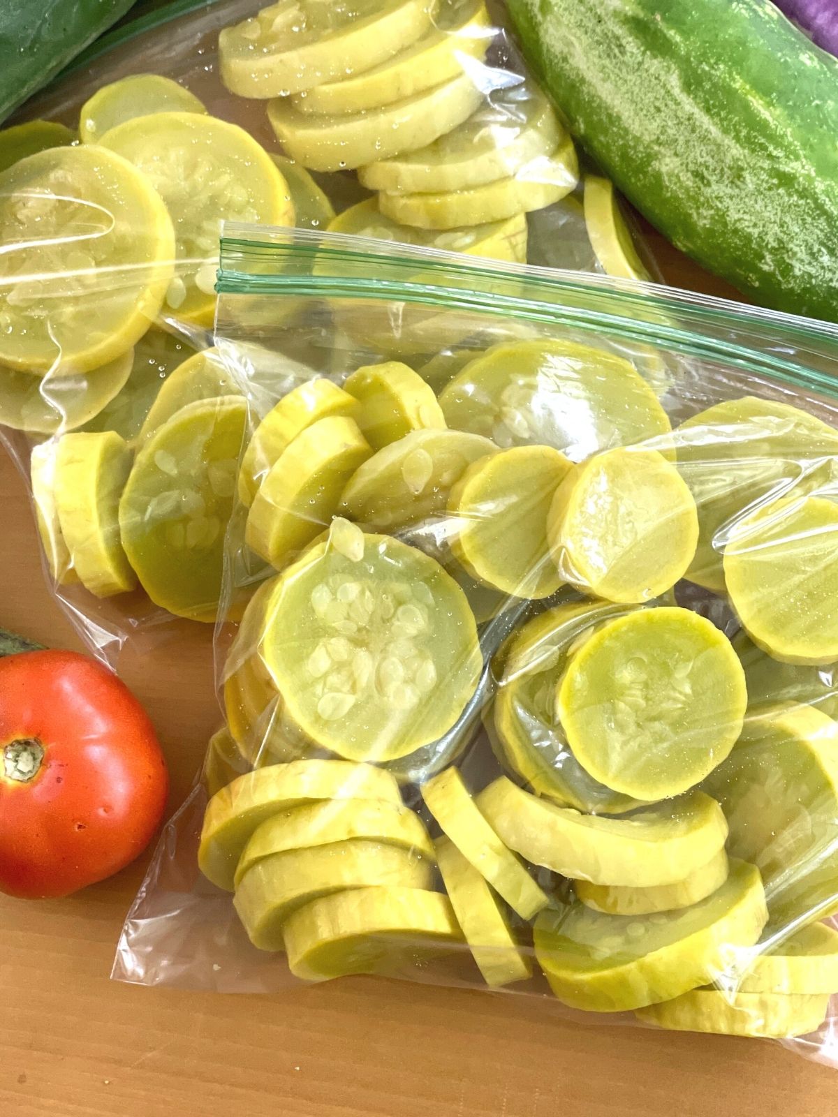 Two bags of prepared yellow squash ready to go into the freezer.