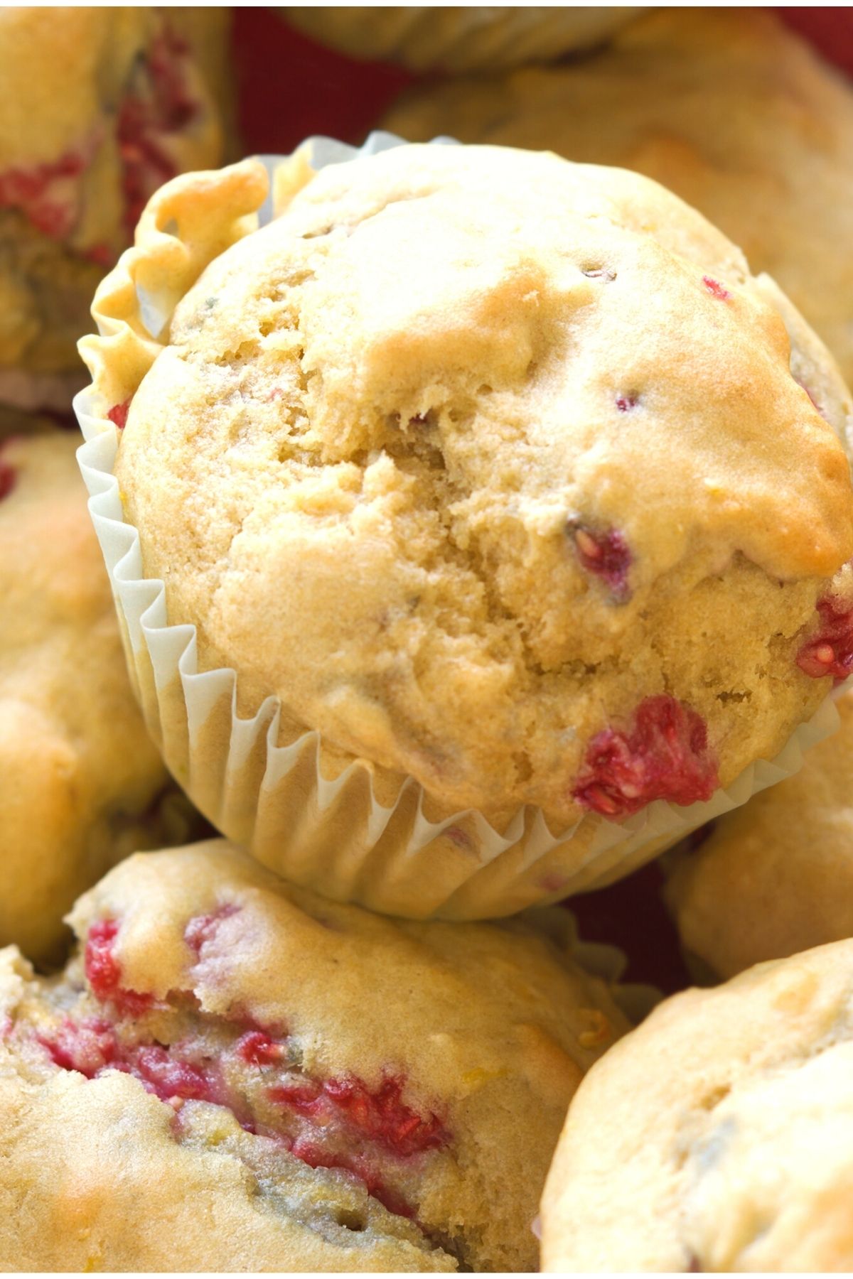 lemon raspberry muffins with liners.