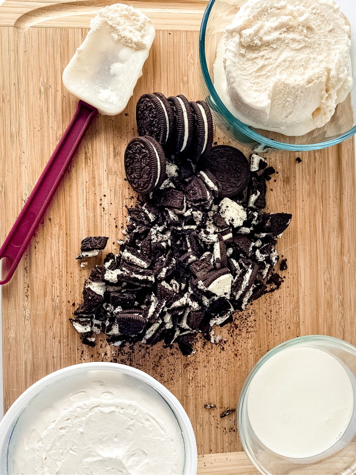Oreo McFlurry ingredients which include crushed oreo cookies, whipped topping, half and half, and vanilla ice cream.