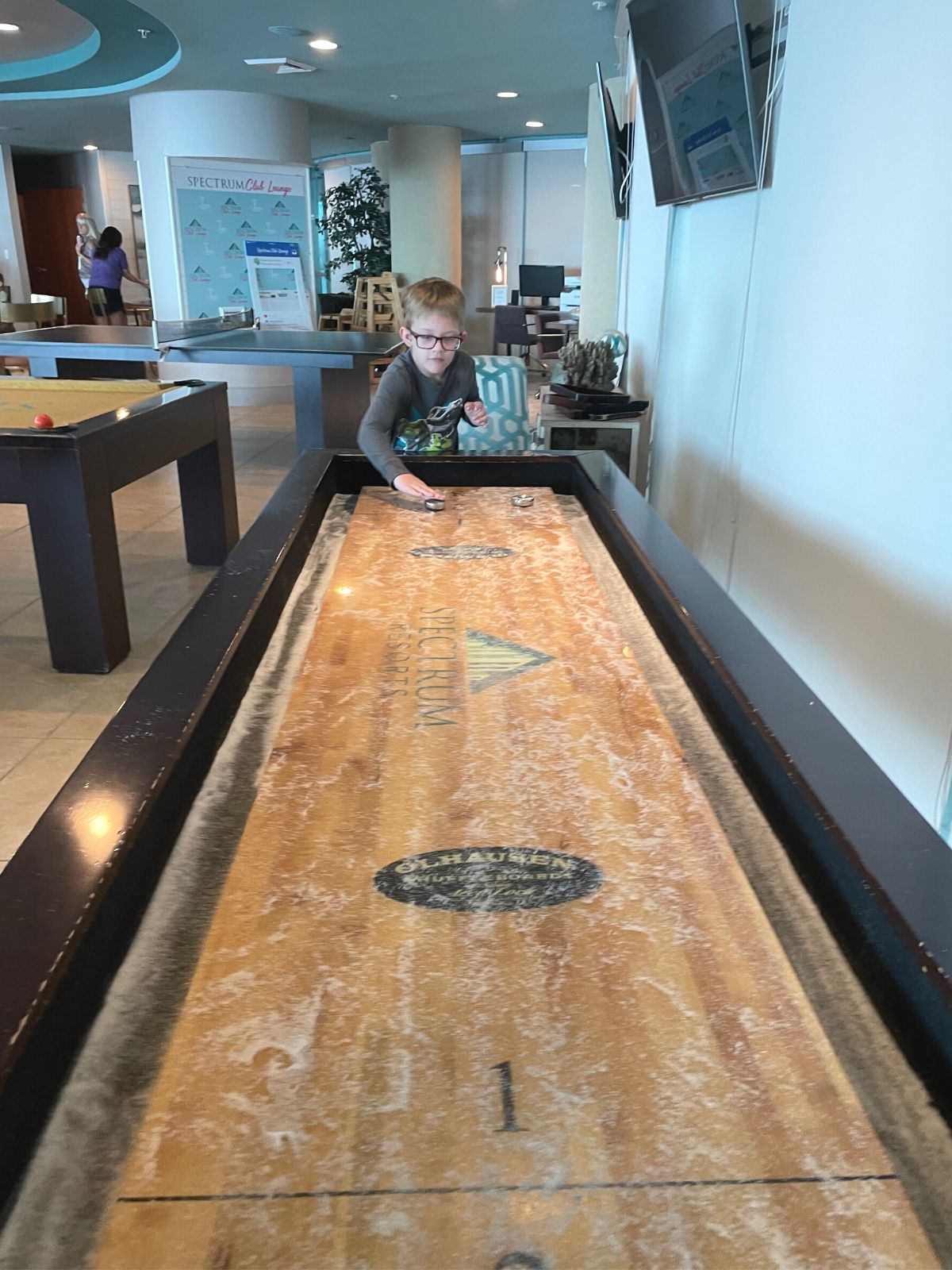 Spectrum Club Lounge shuffleboard game.