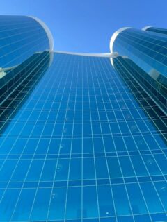 ground angle shot of turquoise place tower d looking up to the top.