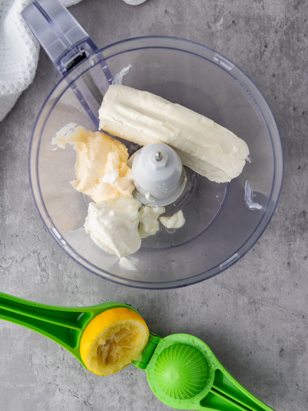 Cream cheese, sour cream, lemon juice, and mayo in a small food processor. 